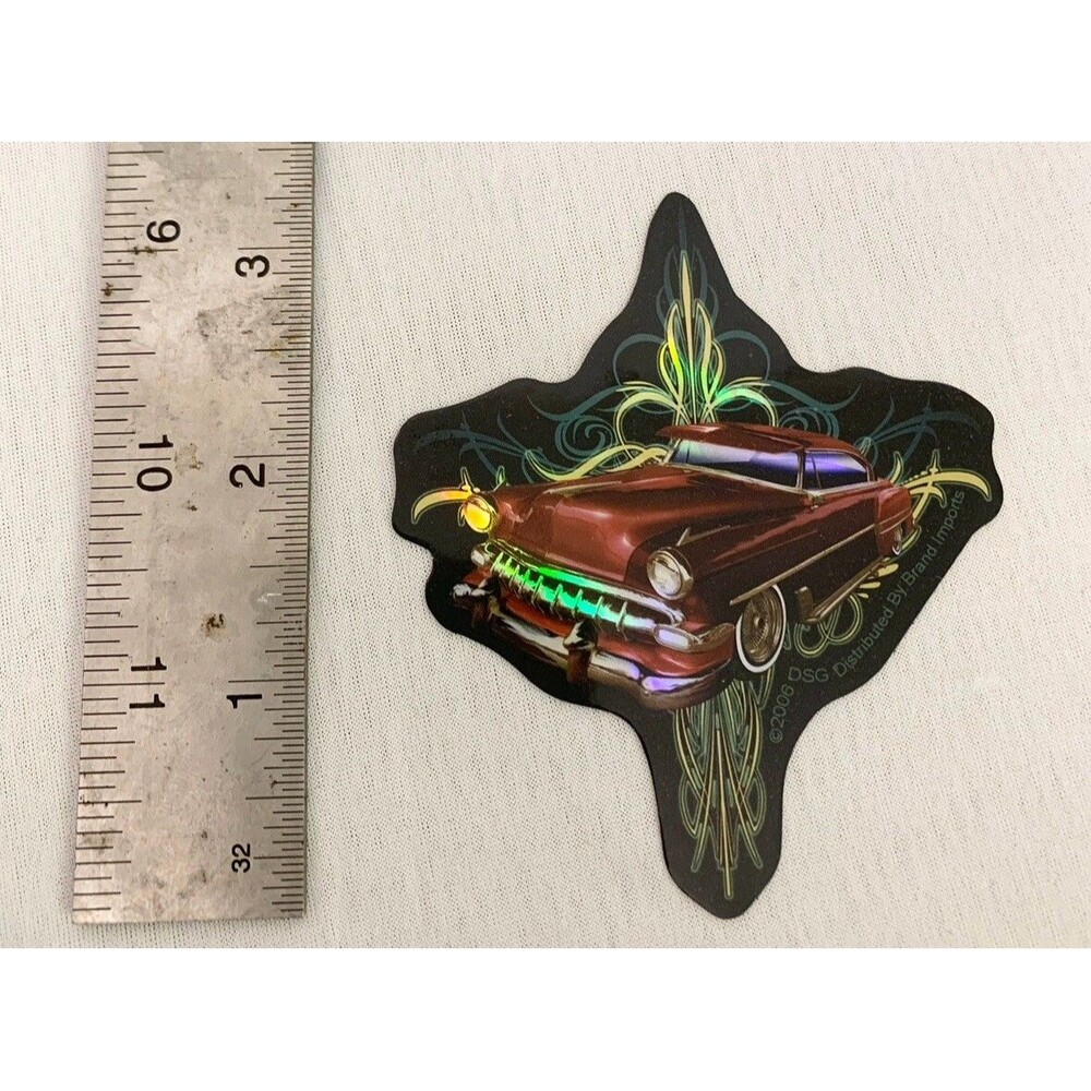 VTG DSG Brand Imports Vending Sticker 2006 RED VINTAGE CAR TRIBAL Holographic